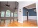 Open concept living room with vaulted ceilings and plenty of natural light at 7037 Tara Dr, Villa Rica, GA 30180