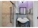 Updated bathroom with shower, safety handle, and storage at 226 Creek View Ln, Acworth, GA 30102