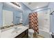 Bathroom features a sleek vanity, medicine cabinet, and a shower-tub combo at 226 Creek View Ln, Acworth, GA 30102