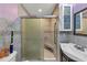 Bathroom featuring shower with seat, tile details, and an updated vanity at 226 Creek View Ln, Acworth, GA 30102