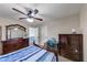 Bedroom featuring a spacious bed, traditional dresser, and warm neutral tones at 226 Creek View Ln, Acworth, GA 30102