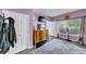 Bedroom featuring large dresser, closet, and television at 226 Creek View Ln, Acworth, GA 30102