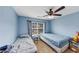 Bedroom with two twin beds, ceiling fan, and window at 226 Creek View Ln, Acworth, GA 30102