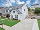 Two-story home featuring a driveway with a basketball hoop and a fenced-in backyard at 226 Creek View Ln, Acworth, GA 30102