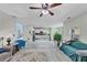 Open-concept living room showcasing wood floors and flow into the kitchen at 226 Creek View Ln, Acworth, GA 30102