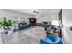 Bright living room with lots of seating options, large tv and nice area rug at 226 Creek View Ln, Acworth, GA 30102