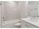 Bathroom with white marble and shower/tub combo at 2734 Bell Se Dr, Smyrna, GA 30080