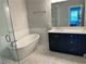 Modern bathroom featuring a soaking tub, double vanity, and stylish fixtures at 2734 Bell Se Dr, Smyrna, GA 30080