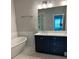 Modern bathroom featuring a soaking tub, double vanity, and stylish fixtures at 2734 Bell Se Dr, Smyrna, GA 30080