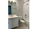 Bathroom with a shower/tub, white vanity, and a toilet at 2734 Bell Se Dr, Smyrna, GA 30080
