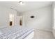 Spacious bedroom with convenient ensuite bathroom access and natural light at 2734 Bell Se Dr, Smyrna, GA 30080