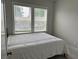 Cozy bedroom with natural light, a comfy bed, and carpet at 2734 Bell Se Dr, Smyrna, GA 30080