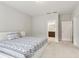 Large bedroom featuring access to a bathroom and bright natural light at 2734 Bell Se Dr, Smyrna, GA 30080