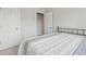 Bedroom with open doorway and plush patterned bedding at 2734 Bell Se Dr, Smyrna, GA 30080