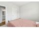 Bedroom featuring neutral colored bedspread and two doorways at 2734 Bell Se Dr, Smyrna, GA 30080
