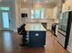 Beautiful kitchen with island seating, stainless appliances, and white countertops at 2734 Bell Se Dr, Smyrna, GA 30080