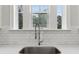 Close-up of the kitchen sink with a view to the backyard at 2734 Bell Se Dr, Smyrna, GA 30080