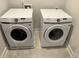 Laundry room featuring side-by-side Samsung washer and dryer at 2734 Bell Se Dr, Smyrna, GA 30080