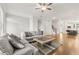 Spacious living room showcases hardwood floors, gray couches, and natural light at 2734 Bell Se Dr, Smyrna, GA 30080