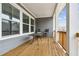 Spacious porch with wooden deck, railings, outdoor table and chairs at 2734 Bell Se Dr, Smyrna, GA 30080