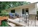 Charming back patio with comfortable seating, lush greenery, and beautiful natural light, perfect for relaxation at 3850 Beya Way, Atlanta, GA 30340