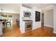 Bright, updated kitchen with white brick accent, granite countertop, and stainless steel appliances, with an adjoining dining area at 3850 Beya Way, Atlanta, GA 30340