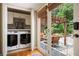 Bright laundry room with washer, dryer, and sliding glass doors to the patio at 3850 Beya Way, Atlanta, GA 30340