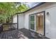 Spacious back deck with sliding glass doors; perfect for outdoor living and enjoying the serene backyard view at 4922 Glenside Ct, Stone Mountain, GA 30088