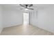 Bright bedroom features neutral walls, hardwood flooring, and ample closet space at 4922 Glenside Ct, Stone Mountain, GA 30088