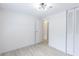 Spacious bedroom with hardwood flooring and closet with louvered doors at 4922 Glenside Ct, Stone Mountain, GA 30088