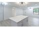 Open and spacious living area with a marble island at 4922 Glenside Ct, Stone Mountain, GA 30088