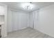 Living room featuring sliding glass doors and closet with louvered doors at 4922 Glenside Ct, Stone Mountain, GA 30088