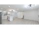 Open concept living area with kitchen island and view of hallway and the exterior at 4922 Glenside Ct, Stone Mountain, GA 30088