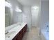 Spacious bathroom features double sinks, and a separate shower and tub at 210 Morning Dove Ln, Suwanee, GA 30024