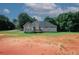 Expansive backyard with a deck and plenty of room for outdoor activities at 940 Sandy Ford Rd, Social Circle, GA 30025