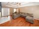 Spacious living room with hardwood floors and ample natural light at 940 Sandy Ford Rd, Social Circle, GA 30025