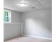 Bright basement featuring a window and carpeted floors at 232 Barrett Springs Way, Canton, GA 30115