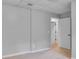 Spacious basement with an open doorway at 232 Barrett Springs Way, Canton, GA 30115