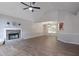 Spacious living room with vaulted ceilings, stone fireplace, wood-look floors and lots of natural light at 232 Barrett Springs Way, Canton, GA 30115