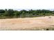 Aerial view capturing the expansive beach and lake, showcasing a serene outdoor recreational space at 433 Pine Dr, Pine Lake, GA 30072