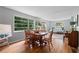 Cozy living area with wood floors and large windows at 433 Pine Dr, Pine Lake, GA 30072