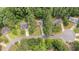 Charming single-story home nestled among mature trees on a cul-de-sac with a long driveway at 506 Bluff Ct, Woodstock, GA 30188