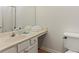 Neat bathroom featuring a vanity with a sink and white towels for a spa-like feel at 506 Bluff Ct, Woodstock, GA 30188