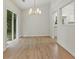Dining area with natural light and hardwood floors at 506 Bluff Ct, Woodstock, GA 30188