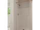 Bathroom with walk-in shower and tub with a large window at 506 Bluff Ct, Woodstock, GA 30188