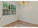 Window with wooded view and overhead lighting at 506 Bluff Ct, Woodstock, GA 30188