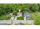 Aerial view of the home with mature trees and a well-maintained lawn at 1001 Dunning Se St, Atlanta, GA 30315