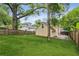 Well-maintained backyard with a lush green lawn and privacy fence, perfect for outdoor activities and relaxation at 1001 Dunning Se St, Atlanta, GA 30315