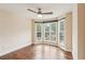 Bedroom with hardwood floors, a ceiling fan, and bay window at 1001 Dunning Se St, Atlanta, GA 30315