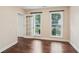 Bright room featuring hardwood floors, natural light and access to the exterior at 1001 Dunning Se St, Atlanta, GA 30315